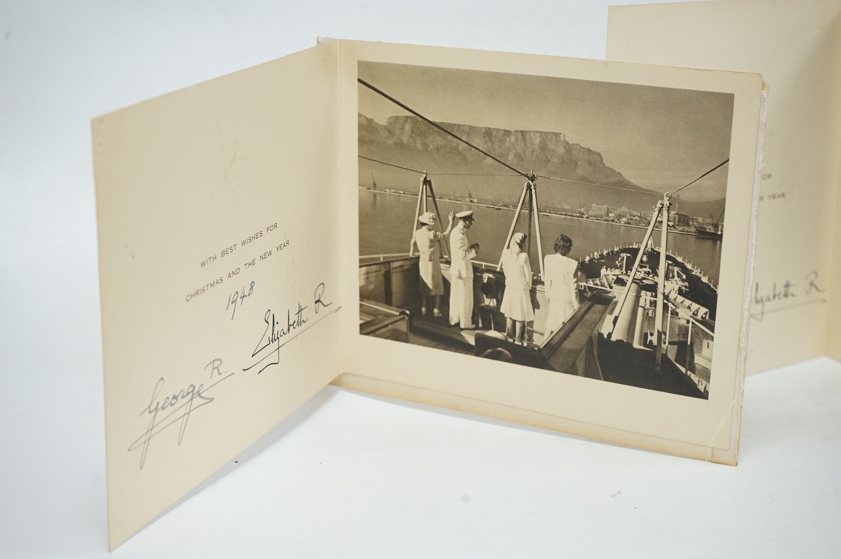 Three Royal Christmas cards from HM King George VI and Queen Elizabeth for 1948, 1949 and 1950, published by Raphael Tuck and Sons Ltd. with gilt embossed crowns on the front, inside; ‘with best wishes for Christmas and